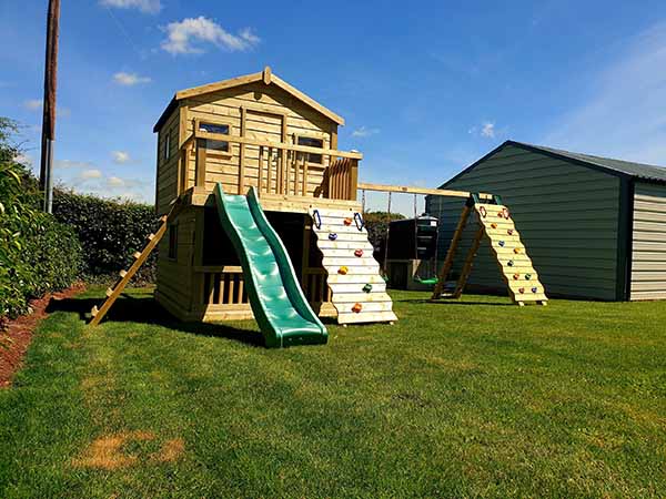 7x7 Otters Cottage With Closed In Bottom and 8ft Monkey Bars
